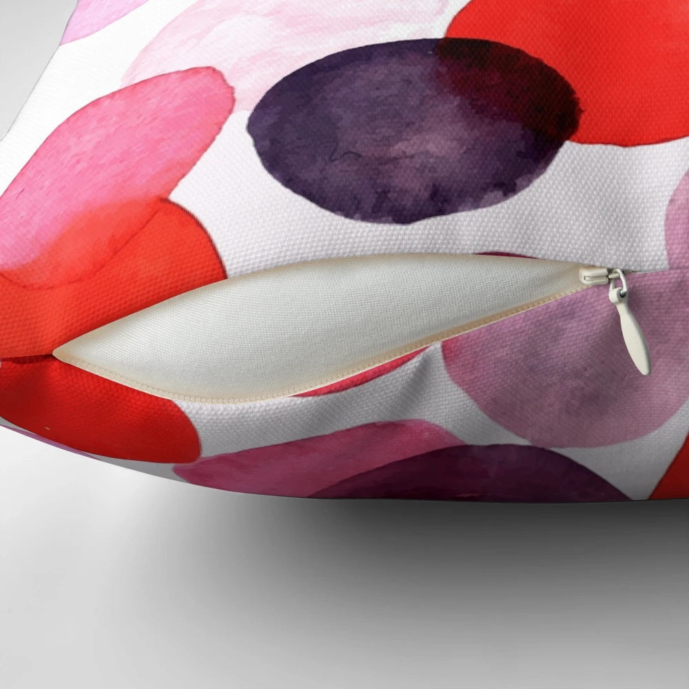 Colorful bubble print pillow with pink, purple, and peach tones