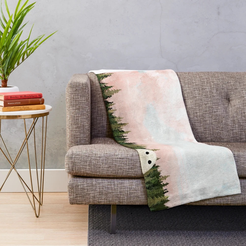 Soft, cozy plush blanket with a dreamy cotton candy sky design