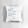 Soft, fluffy white pillow featuring a vibrant dandelion design - perfect for spring and summer decor.