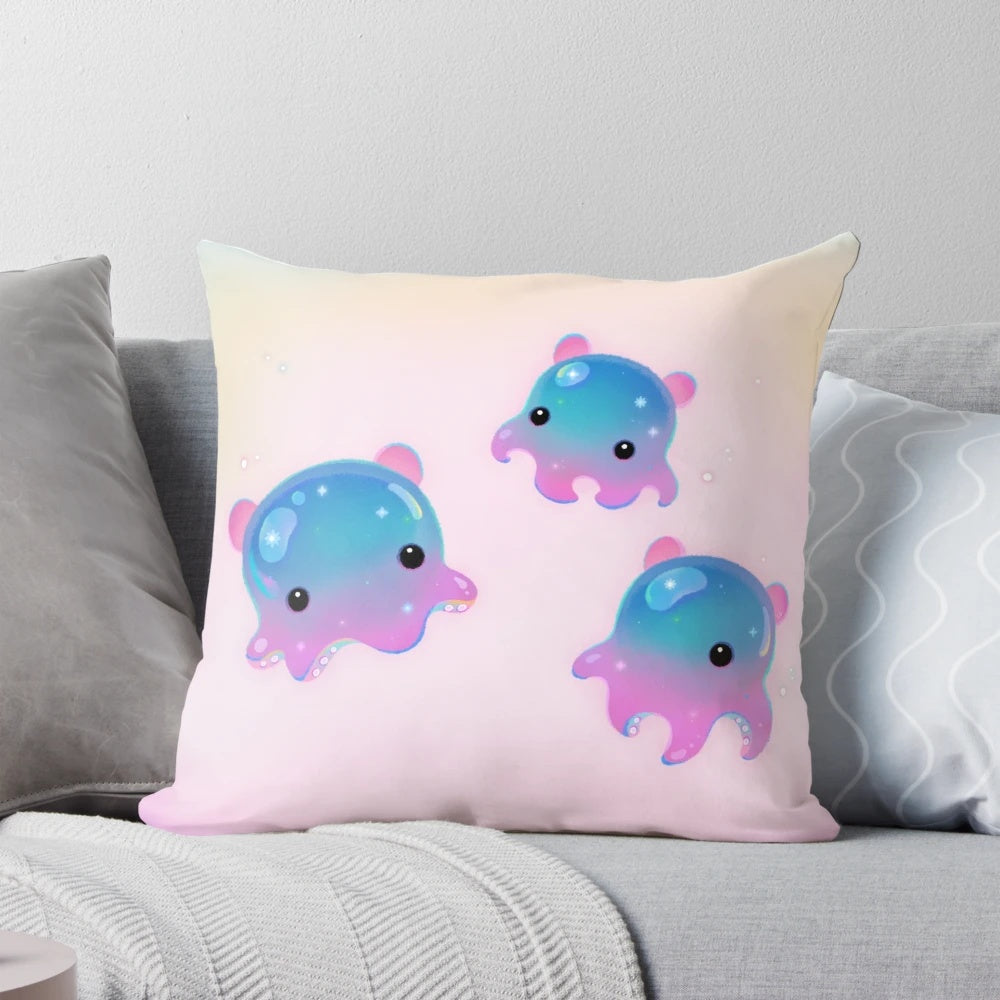 A plush pillow featuring a whimsical illustration of a Dumbo Octopus (Grimpoteuthis), a deep-sea cephalopod known for its distinctive ear-like fins.