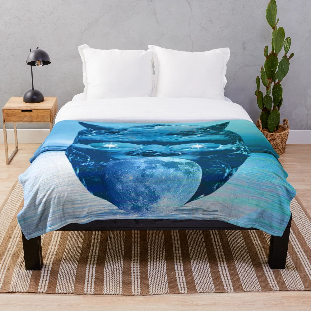 Plush moon mask pattern blanket with abstract, nature-inspired design