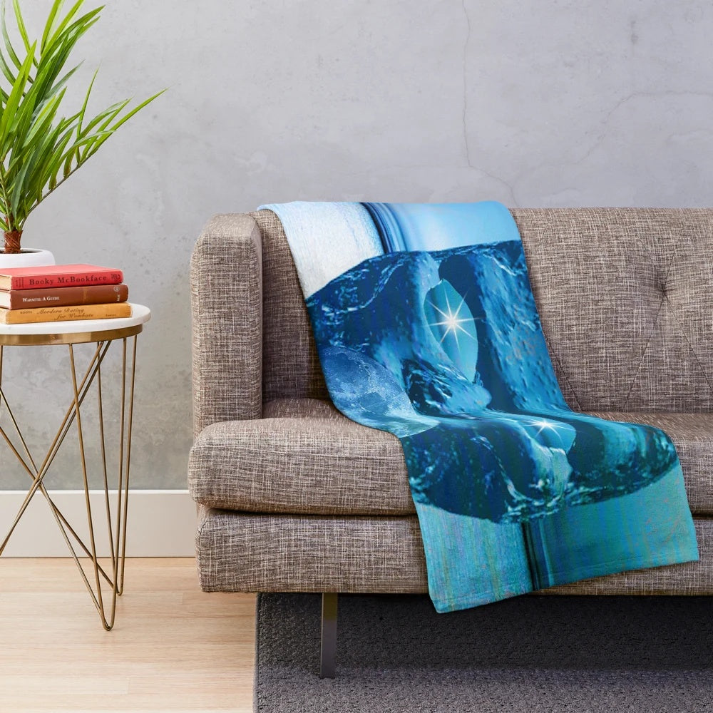 Plush moon mask pattern blanket with abstract, nature-inspired design