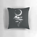 Soft, plush moon-shaped pillow swinging on a metal frame against a starry night sky backdrop