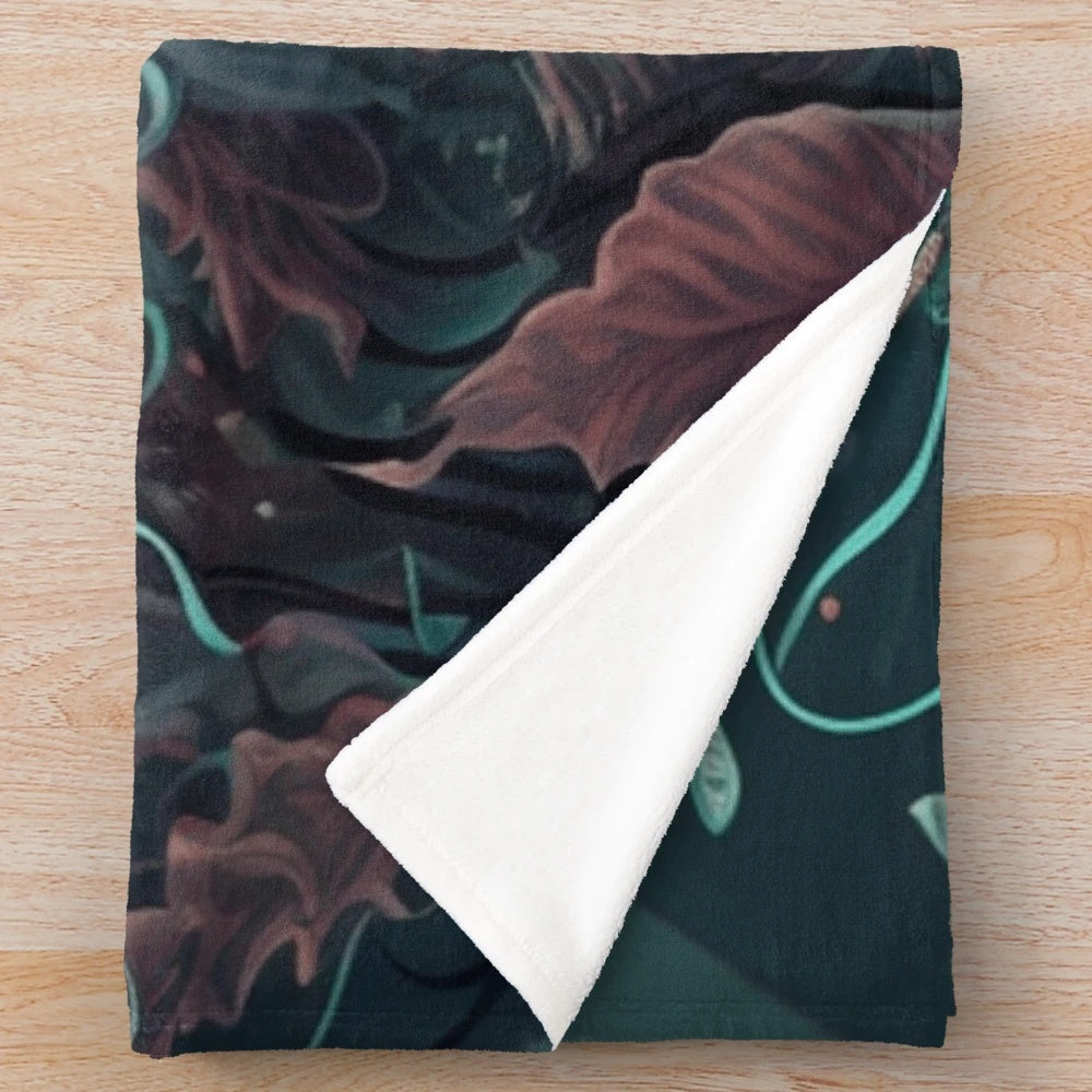 Plush blanket featuring a design of mythical sea creatures