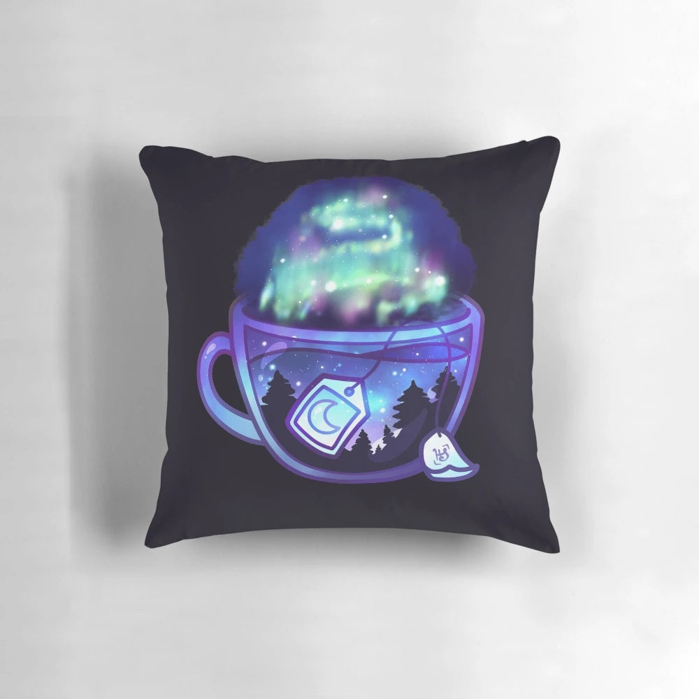 A dreamy, purple and blue Aurora Borealis-inspired tea in a glass teacup, surrounded by stars.