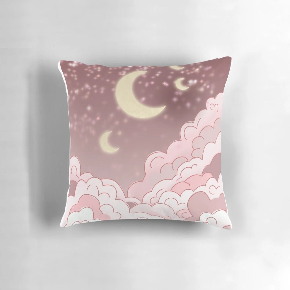 A pink cloud-shaped pillow with a whimsical fairy art design, perfect for napping and relaxation.