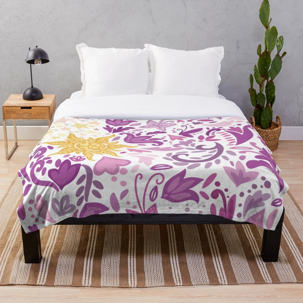 Soft and plush blanket with a sun design inspired by princesses