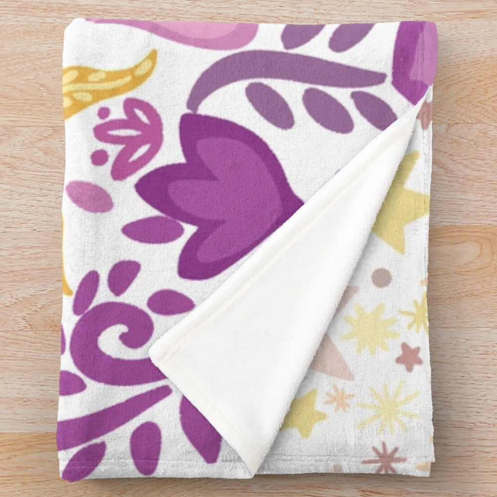 Soft and plush blanket with a sun design inspired by princesses