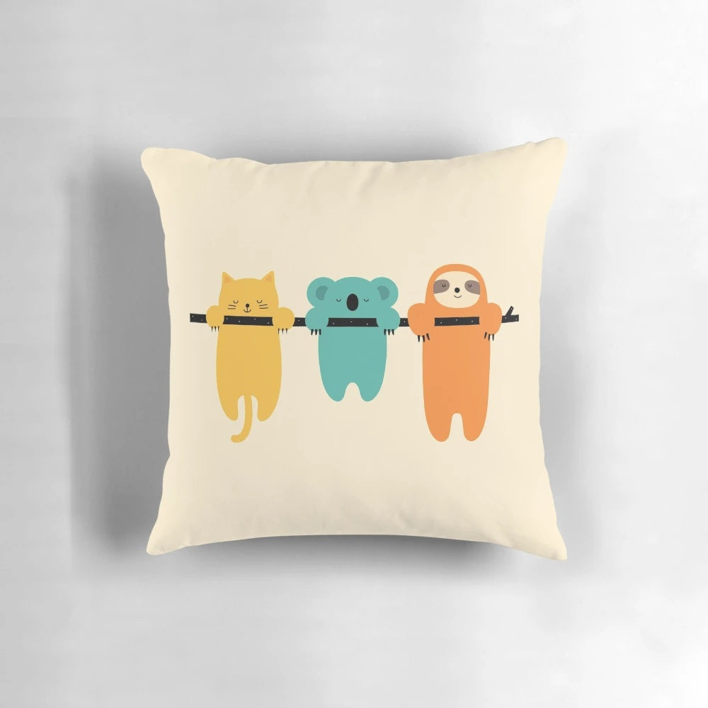 Decorative pillow featuring a sloth and other cute animals in a fantasy, universe-inspired design
