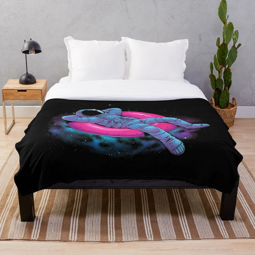 Plush blanket with space, galaxy, and astral design