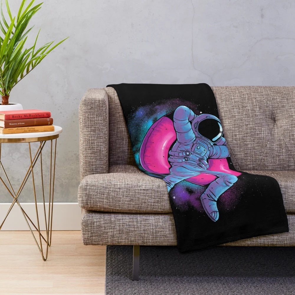 Plush blanket with space, galaxy, and astral design