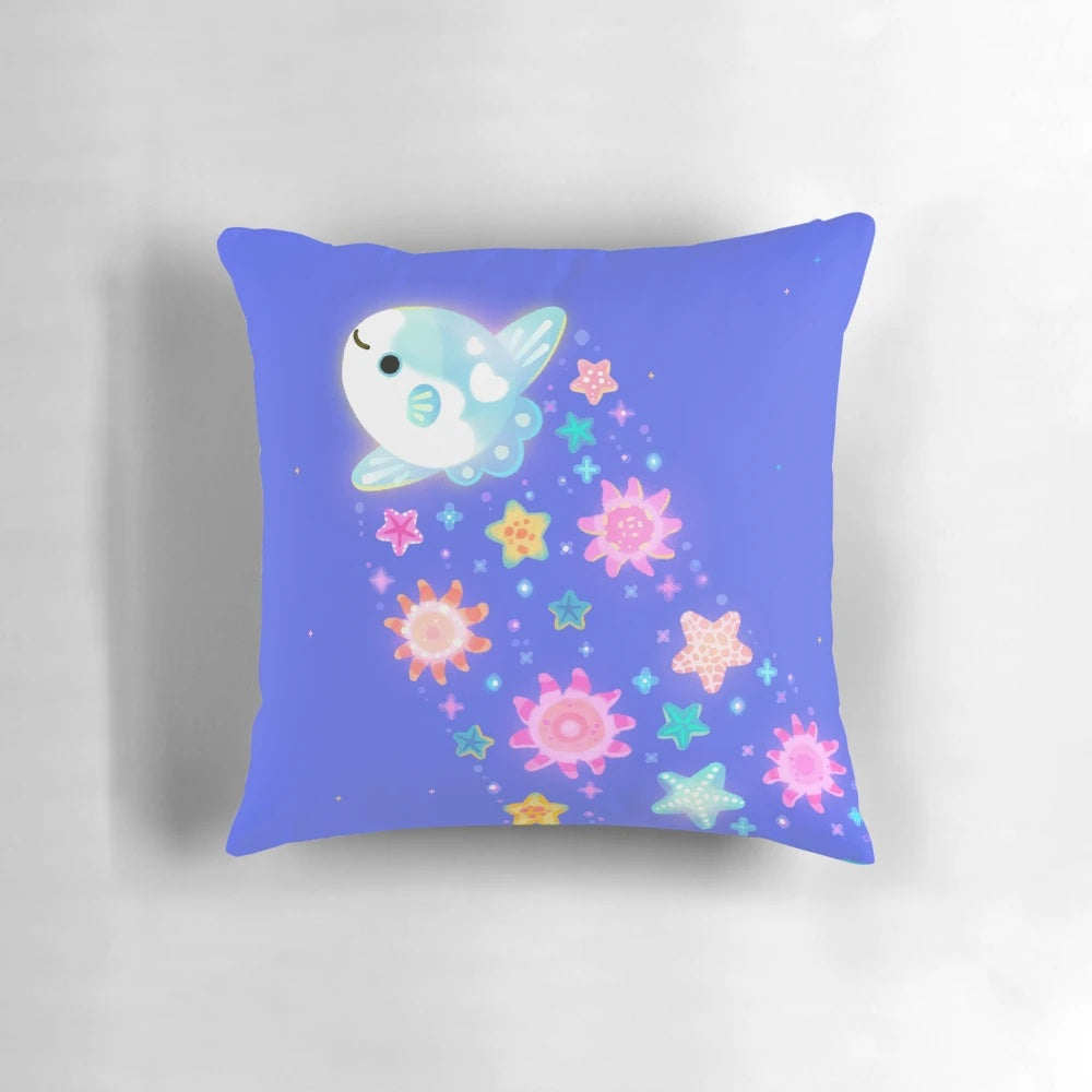 Soft, plush pillow featuring a sun and starfish design, capturing the beauty of marine life