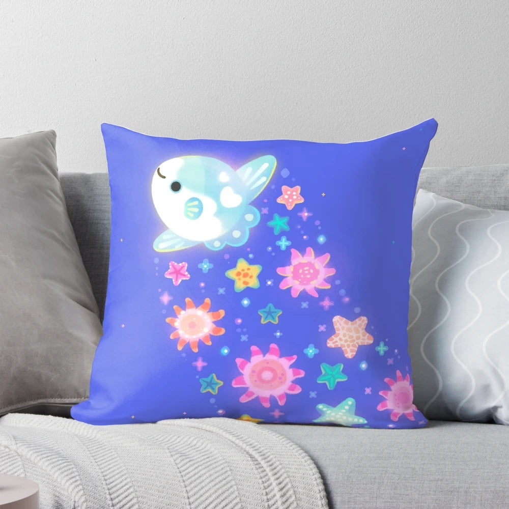 Soft, plush pillow featuring a sun and starfish design, capturing the beauty of marine life