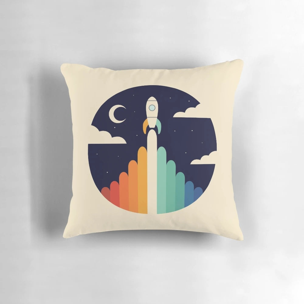 Plush pillow with an "Up" themed design featuring clouds, the moon, and a rocket ship against a night sky.