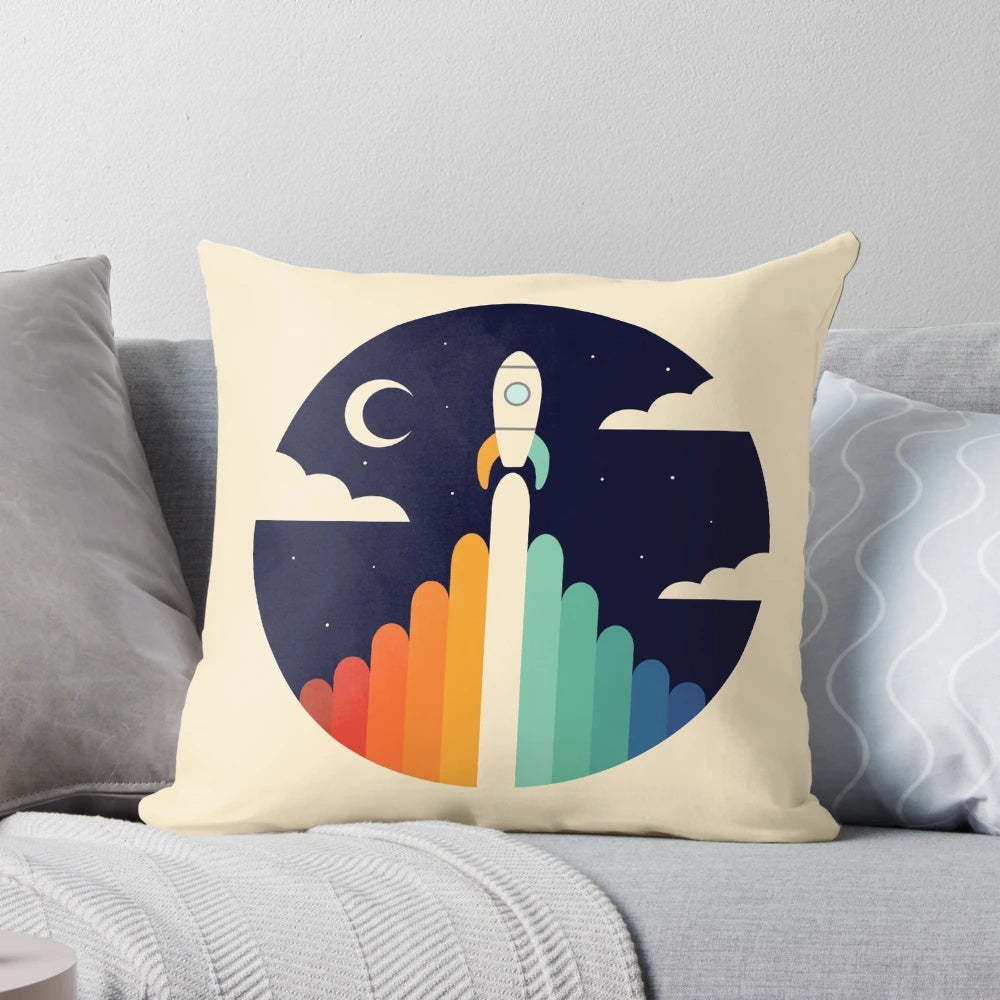 Plush pillow with an "Up" themed design featuring clouds, the moon, and a rocket ship against a night sky.