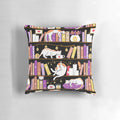 A cozy violet pillow featuring a cartoon cat lounging on a bookshelf