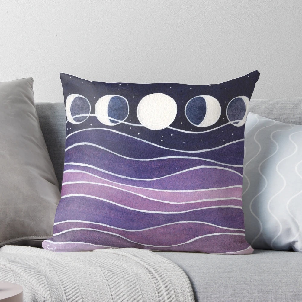 Soft, plush pillow featuring a serene purple and blue watercolor moon design