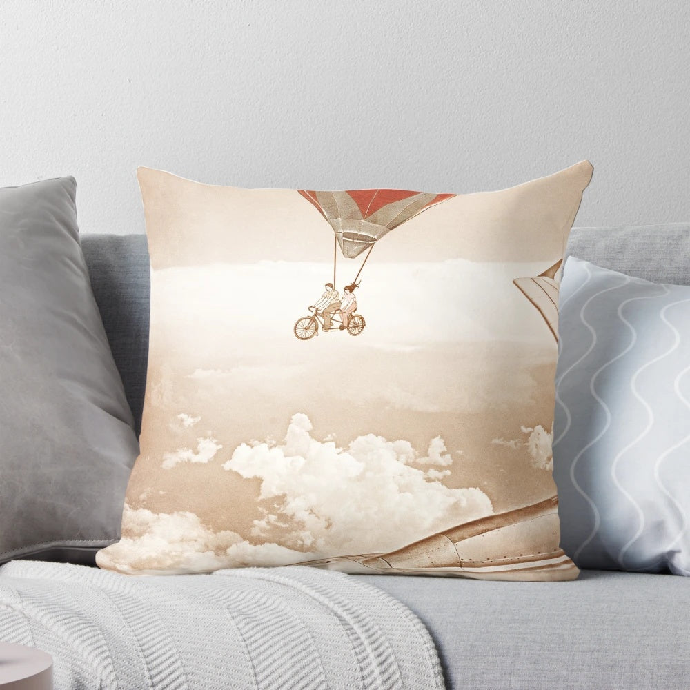 Whimsical vintage-inspired pillow design featuring a couple riding a tandem bicycle among clouds and hot air balloons, with a focus on the "Wednesday Dream" theme.