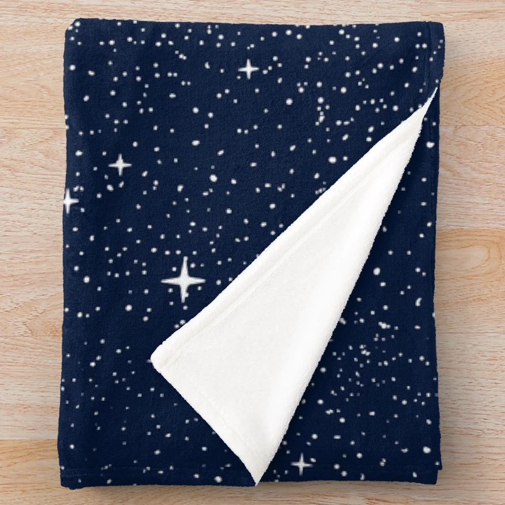 Plush blanket featuring a surreal artwork of a whale shark in a star-filled galaxy