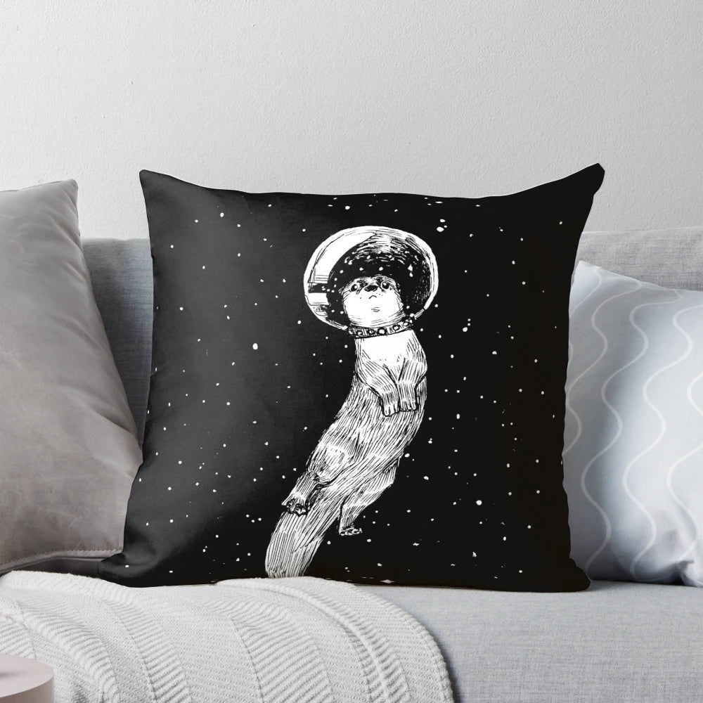 Colorful pillow featuring a drifting otter in a starry outer space scene