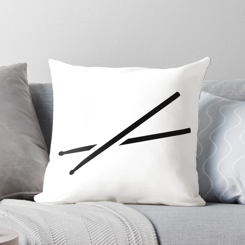 Decorative pillow in the shape of drumsticks, perfect for drummers and music enthusiasts.