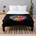 Plush blanket featuring a drummer from the Muppets' Electric Mayhem band