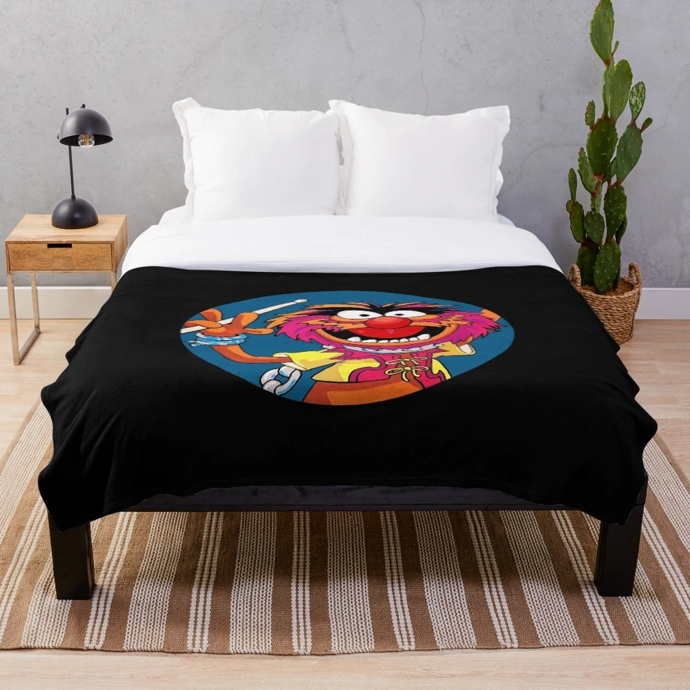 Plush blanket featuring a drummer from the Muppets' Electric Mayhem band