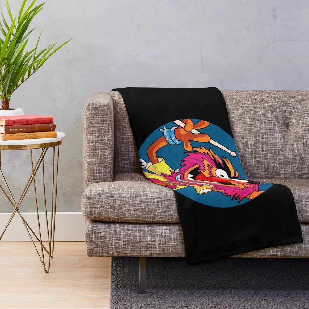 Plush blanket featuring a drummer from the Muppets' Electric Mayhem band
