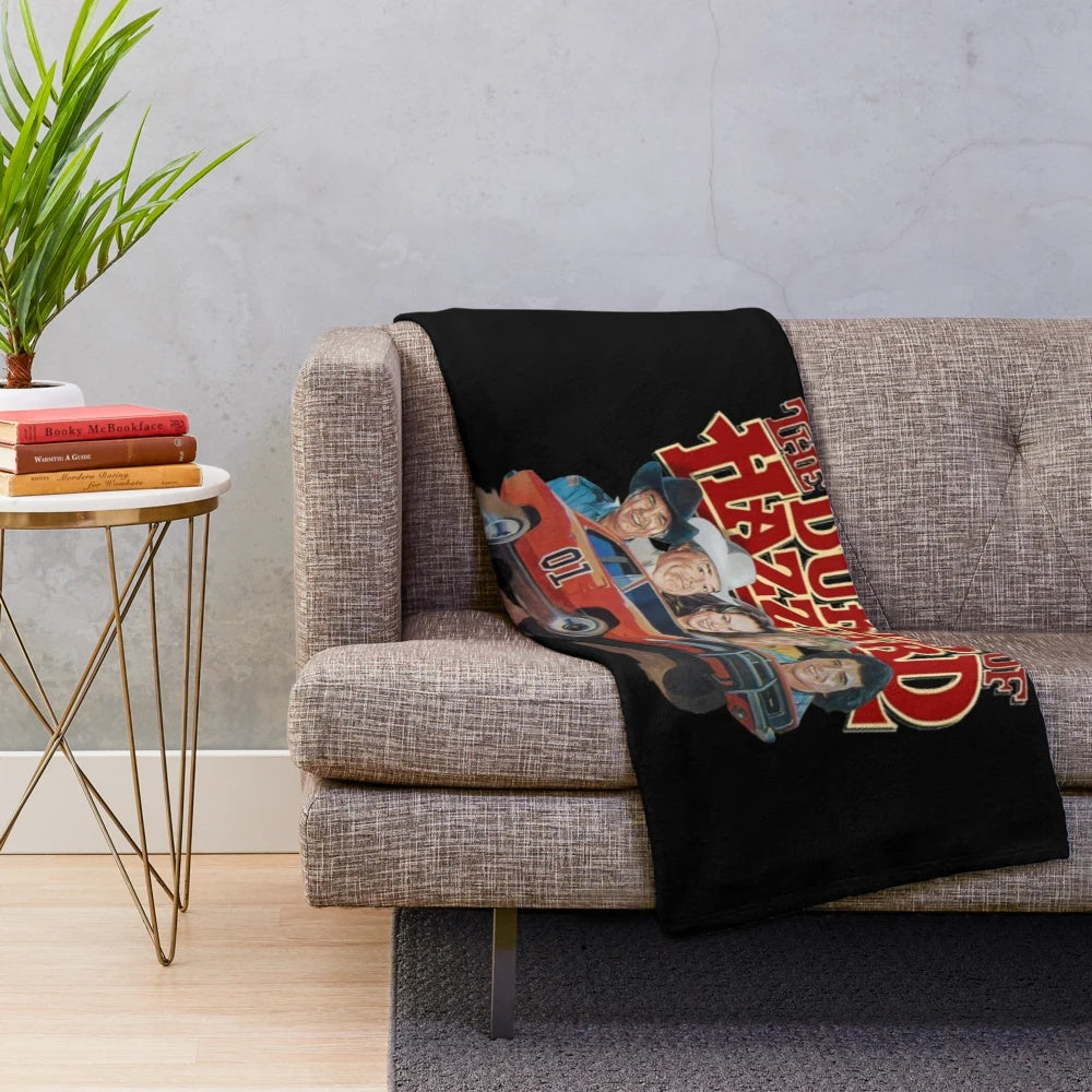 Dukes of Hazzard inspired plush blanket featuring the iconic General Lee car