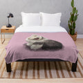 Plush blanket featuring a soft, cozy design inspired by the sheepdog breed