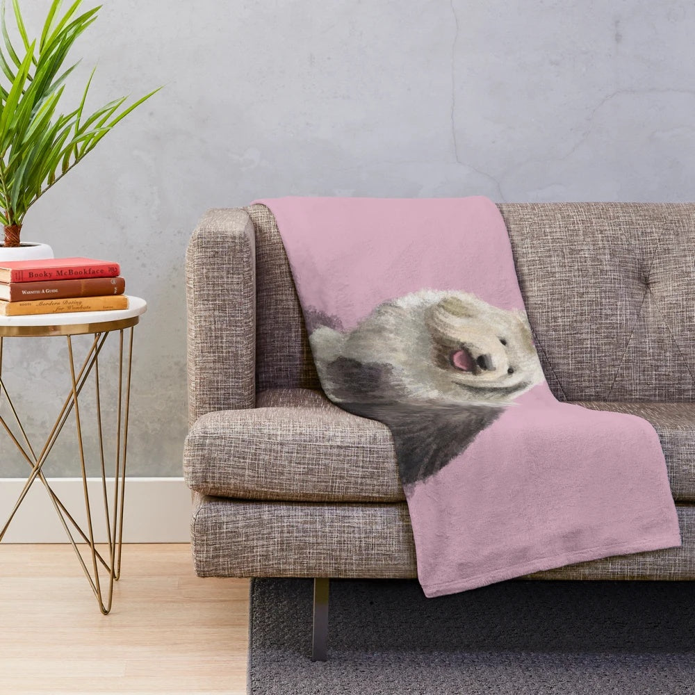 Plush blanket featuring a soft, cozy design inspired by the sheepdog breed