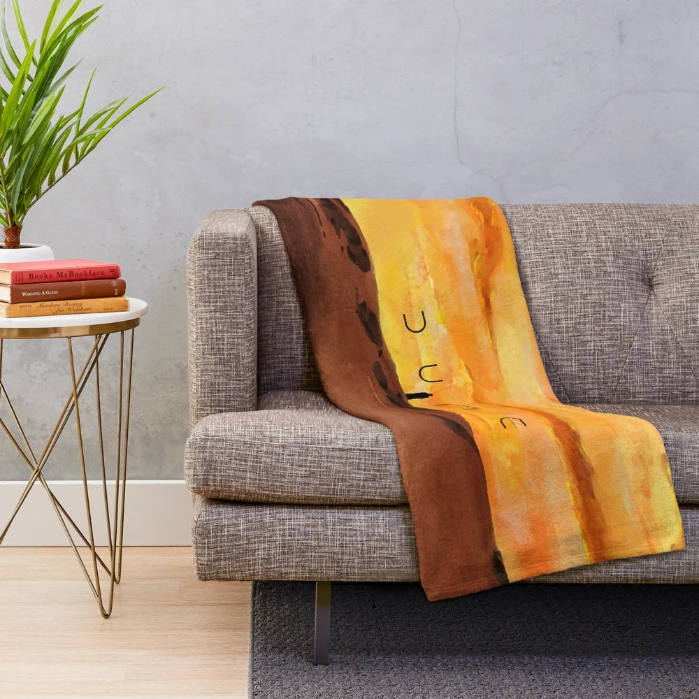 Dune-inspired plush blanket with a captivating desert sunset design