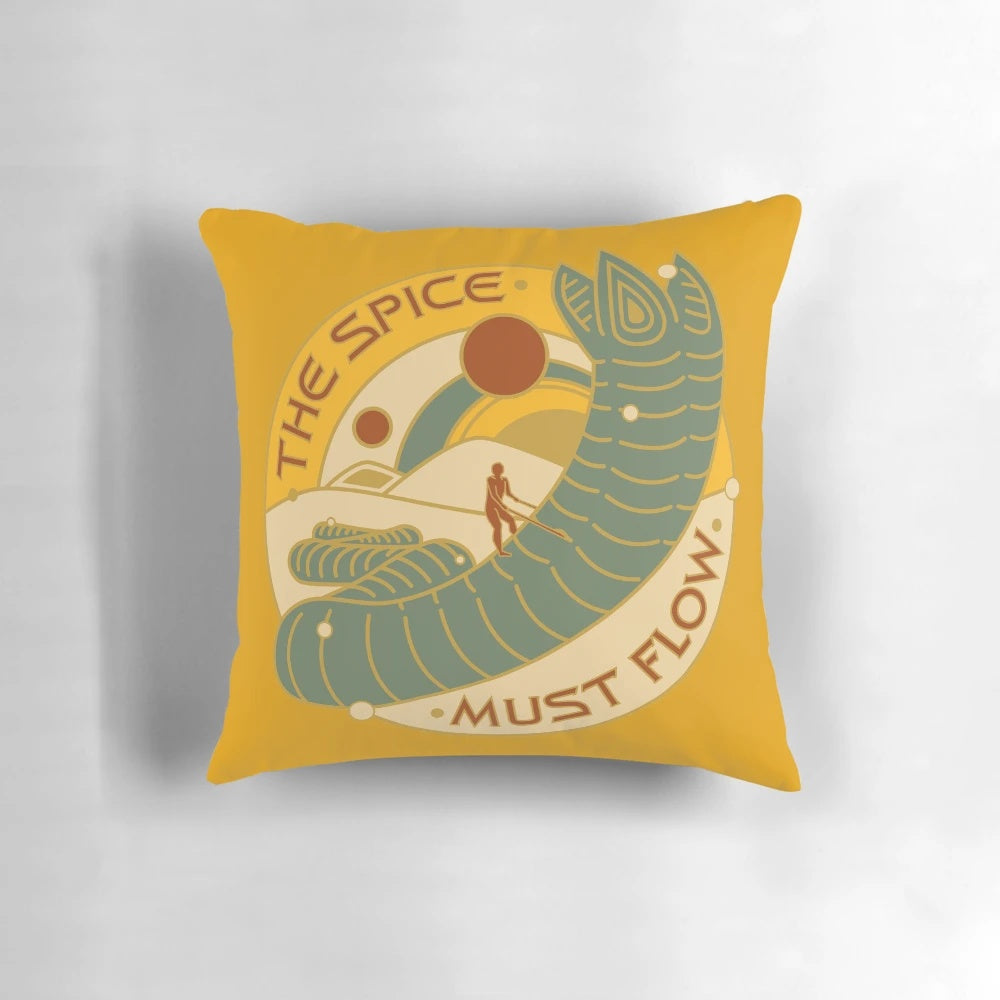 A hand-painted, Dune-themed throw pillow featuring a sandworm and the text "The Spice Must Flow
