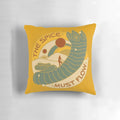 A hand-painted, Dune-themed throw pillow featuring a sandworm and the text "The Spice Must Flow