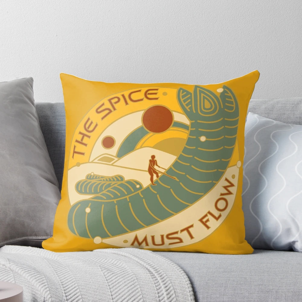 A hand-painted, Dune-themed throw pillow featuring a sandworm and the text "The Spice Must Flow