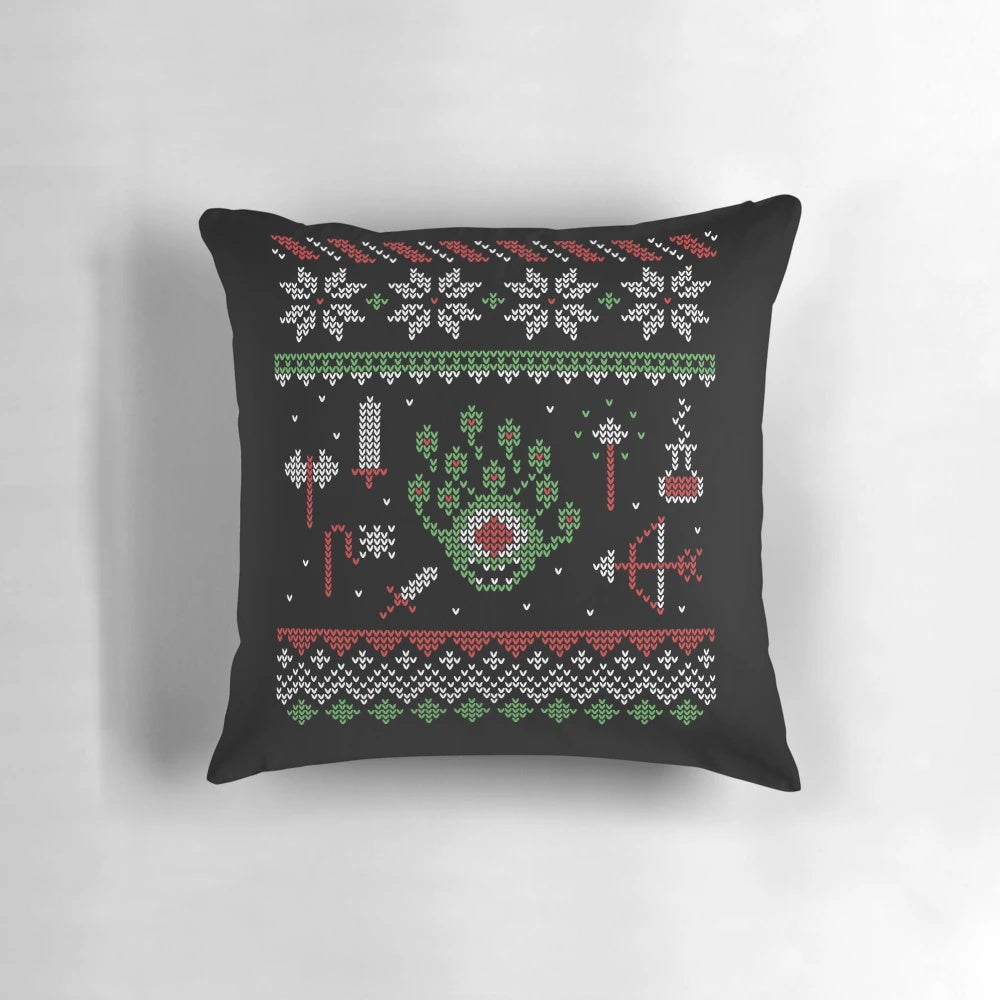 Dungeons & Dragons inspired ugly Christmas sweater pillow featuring a beholder and d20 dice