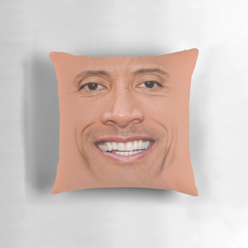 Graphic illustration of Dwayne Johnson's face on a plush pillow