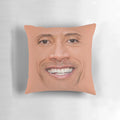 Graphic illustration of Dwayne Johnson's face on a plush pillow