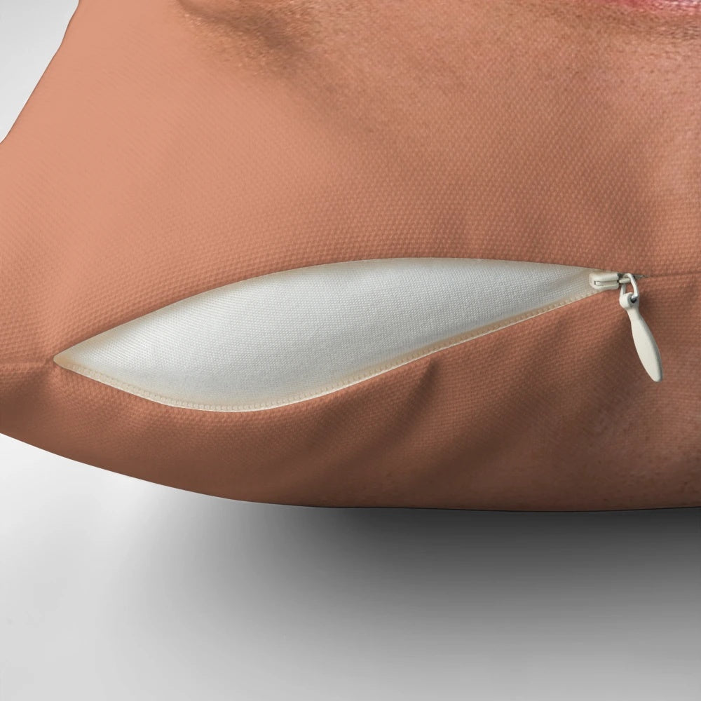 Graphic illustration of Dwayne Johnson's face on a plush pillow