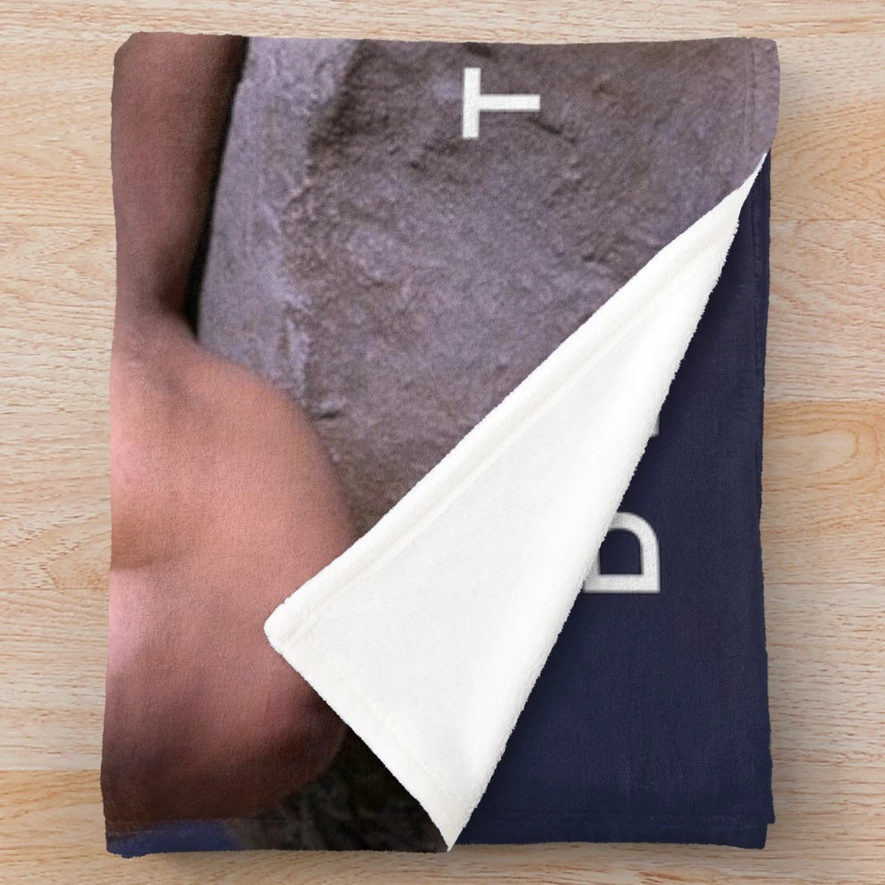 Plush blanket featuring Dwayne Johnson's "The Rock" character