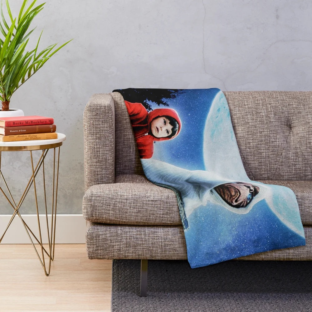 E.T. the Extra Terrestrial inspired plush blanket with alien and bicycle design