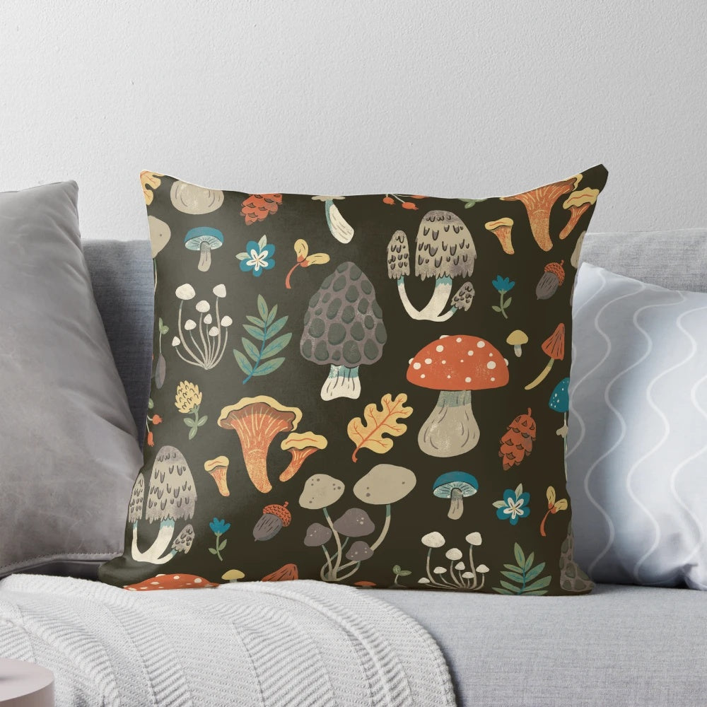 A cozy forest-inspired pillow featuring a repeating mushroom and leaf pattern in shades of brown and green.