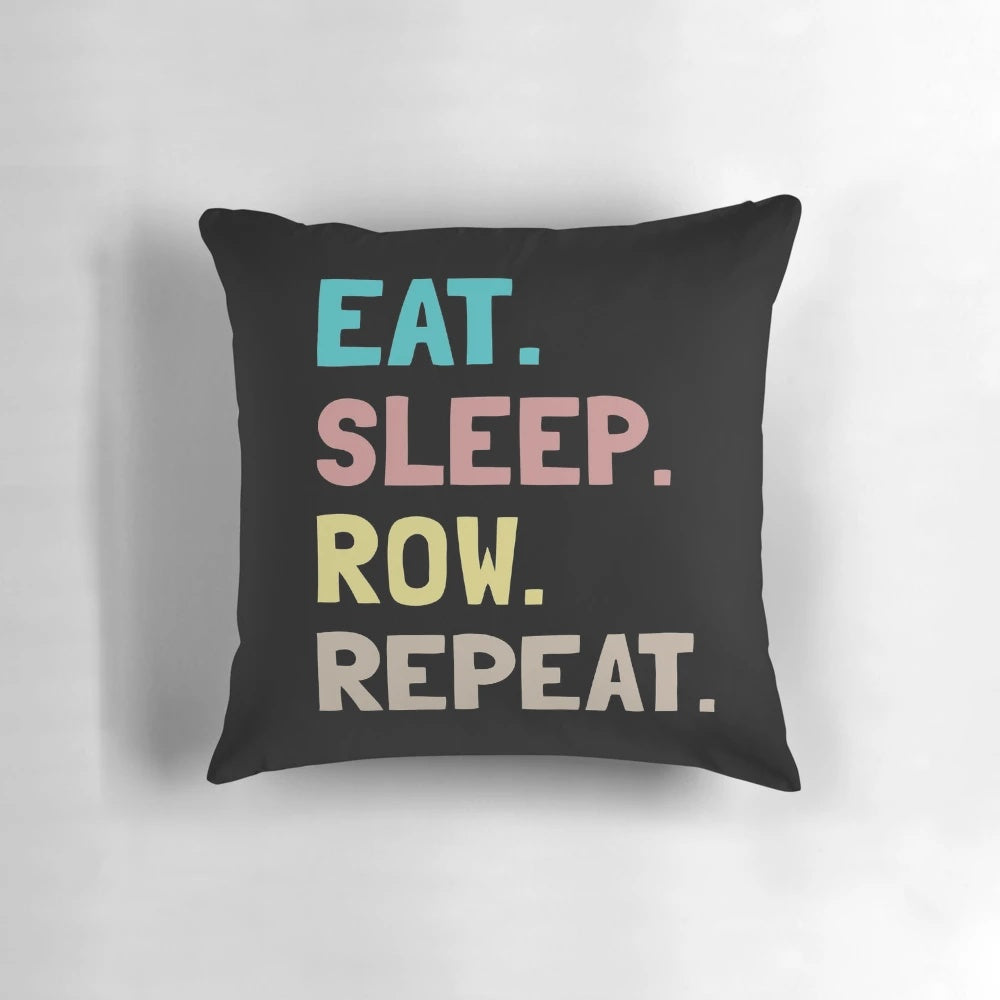 A cozy pillow with the text "Eat Sleep Row Repeat" - the perfect gift for rowers, crew teams, and rowing enthusiasts.
