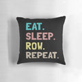 A cozy pillow with the text "Eat Sleep Row Repeat" - the perfect gift for rowers, crew teams, and rowing enthusiasts.