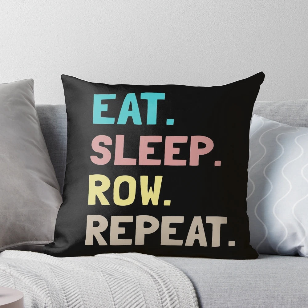 A cozy pillow with the text "Eat Sleep Row Repeat" - the perfect gift for rowers, crew teams, and rowing enthusiasts.