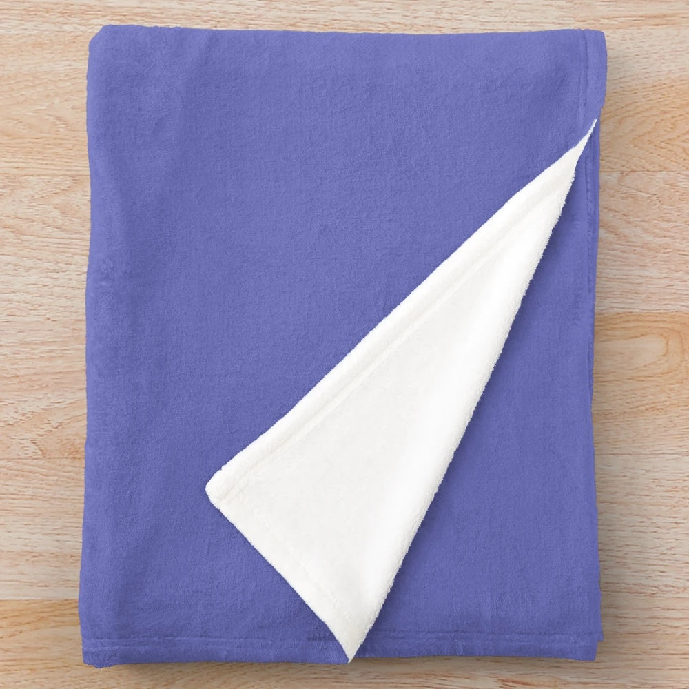 Narwhal plush blanket with "Keep our sea plastic free" message