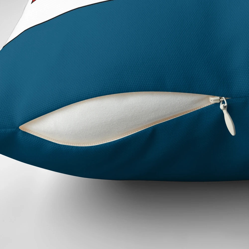 A soft and cozy pillow featuring an illustration of seabirds, promoting climate justice and environmental protection.