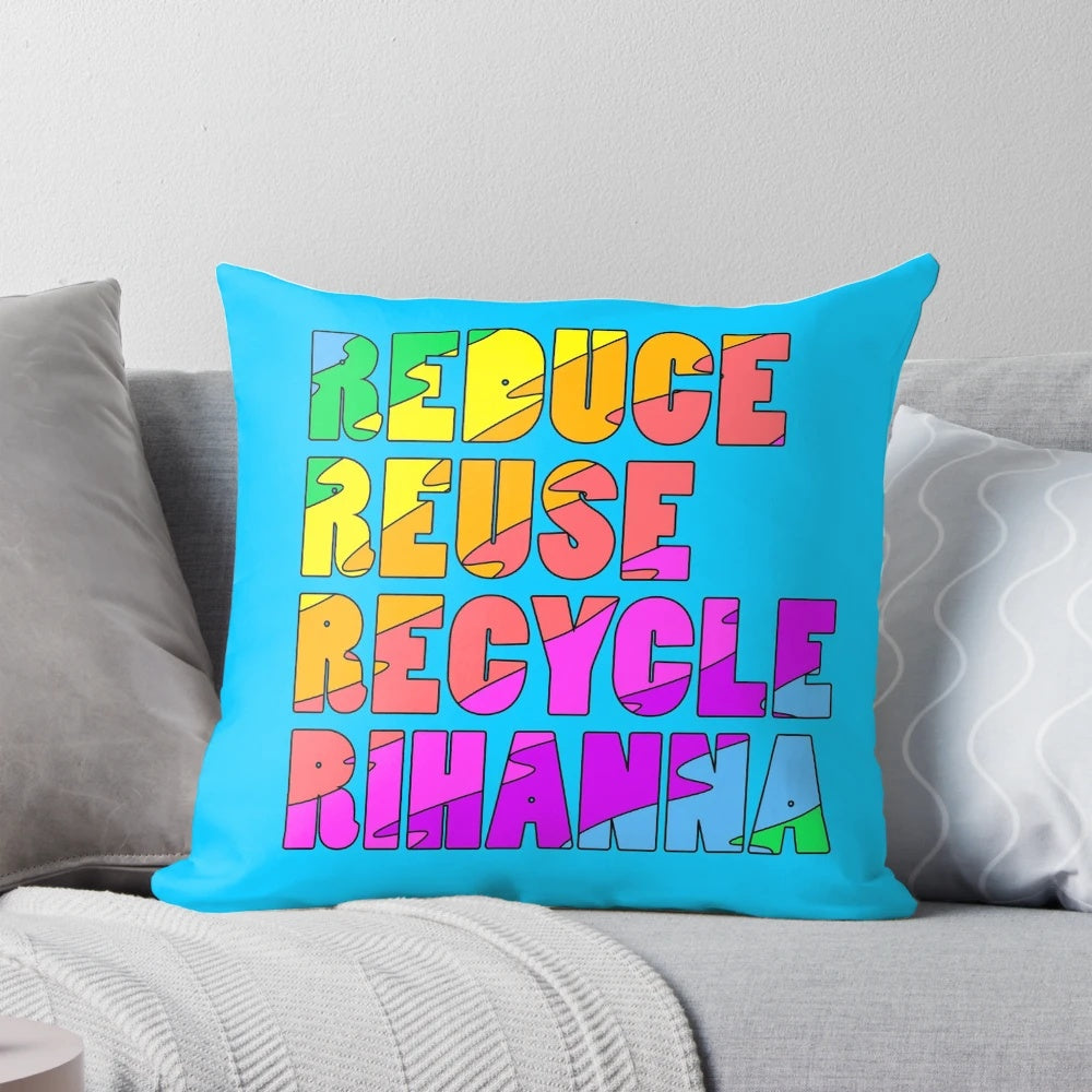Colorful pillow with the text "The Four R's: Reduce, Reuse, Recycle, Rihanna" in a rainbow design