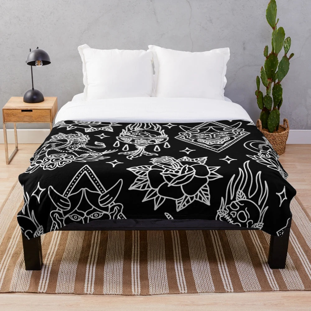 Black and white plush blanket with traditional tattoo pattern design
