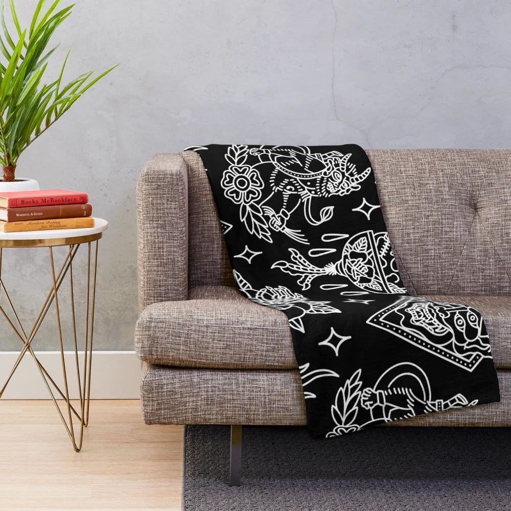 Black and white plush blanket with traditional tattoo pattern design